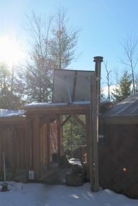 Back of Canadian Solar panels on the treehouse.